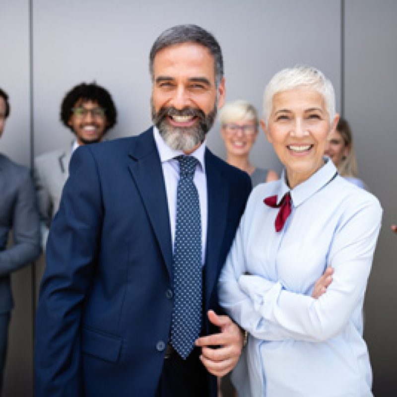 Successful senior team leader and business owner leading informal in-house business meeting. Business and entrepreneurship concept.
